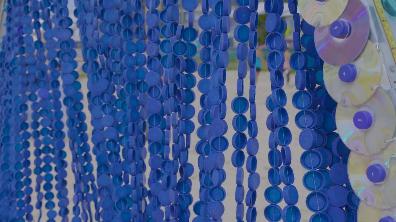 Blue beads and discs at Currumbin Beach festival