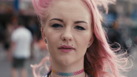 slow motion portrait of caucasian girl with pink hair