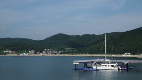 quiet countryside and beach front of belvedere hotel in geonje city south korea - wide shot