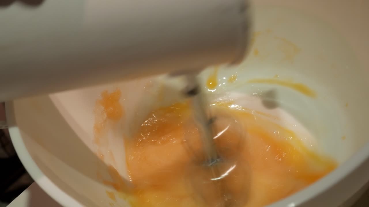 Mixing eggs and sugar for delicious homemade baking experience