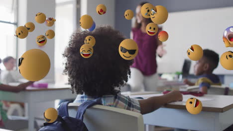 children in classroom with floating emoji animation over their heads