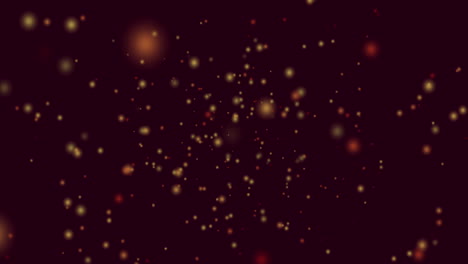 animación de manchas amarillas y rojas de luz volando en movimiento hipnótico sobre fondo negro
