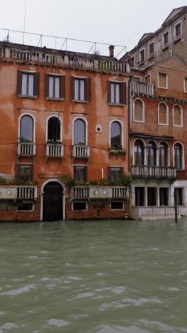 venetian canals and buildings during high tide