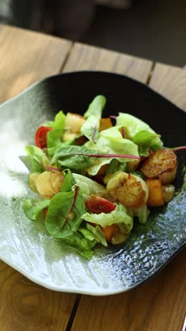 scallop salad on a plate