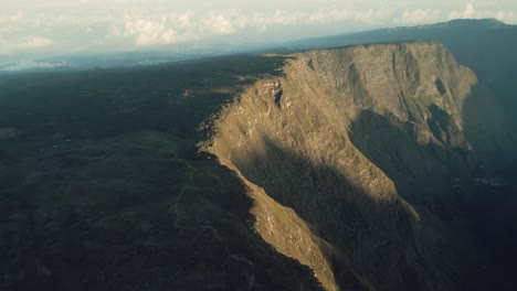 drone flight over a beautiful crater cirque mafate in la reunion just at sunrise