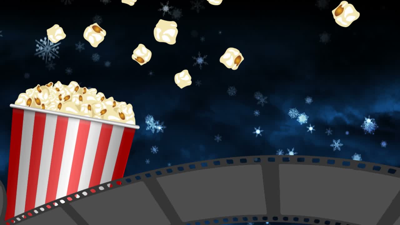 Ikona filmového pásu a nádoby na popcorn na pozadí sněhových vloček padajících na modré pozadí