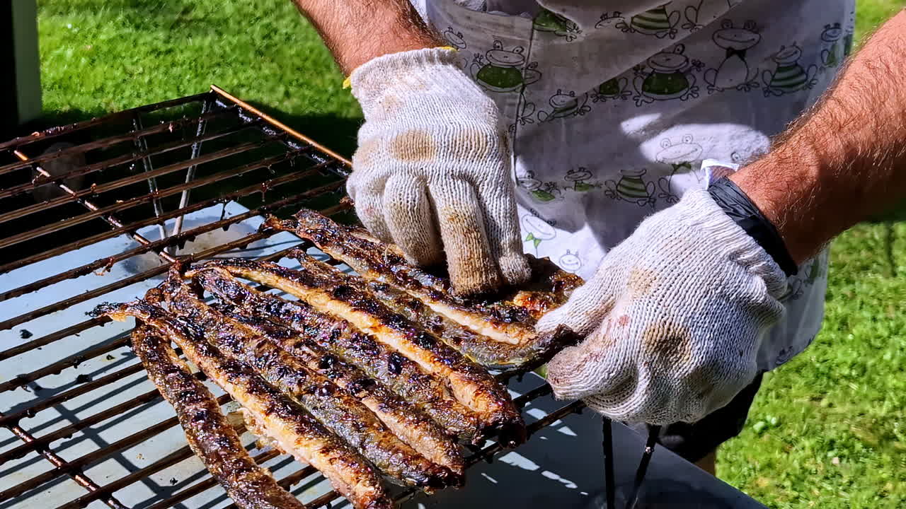 Whole fried lampreys fresh off the grill, Latvian seafood specialties