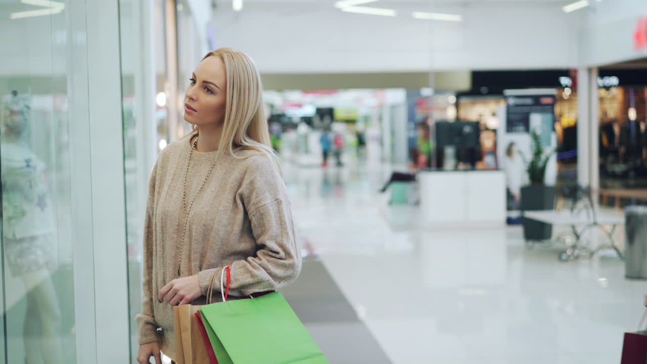 Two friends shopping in a mall