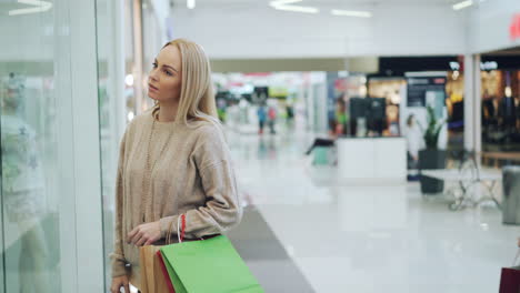 two friends shopping in a mall