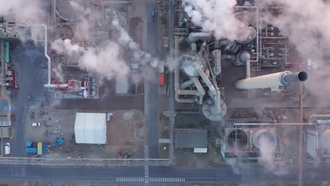 Aerial-Top-Down-view-during-sunrise-of-steel-factory