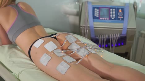 woman undergoing ems body treatment