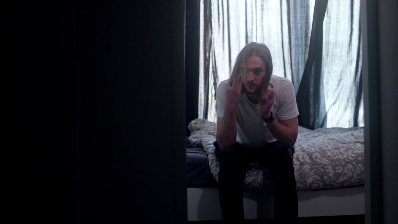 A Man Wakes up With a Hangover After a Night of Heavy Drinking - Static Shot