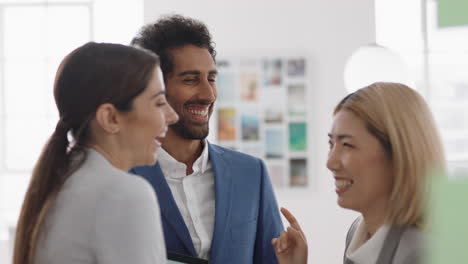 beautiful asian business woman chatting with clients smiling enjoying developing corporate partnership discussing project in modern office workspace