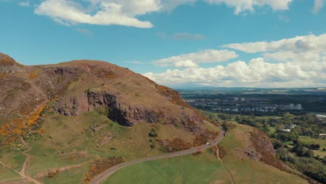 holyrood park in sunny day with few clouds