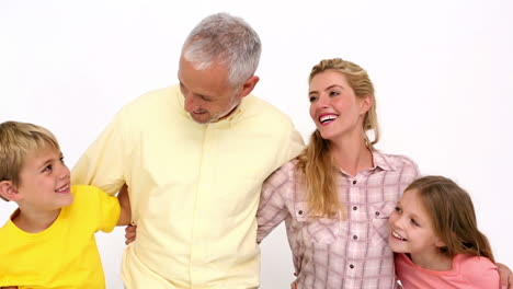 Happy-family-smiling-at-camera