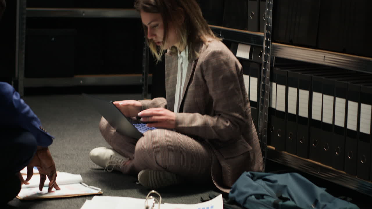 Businesswoman working in storage room