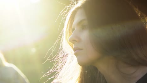 woman in profile, sunlight