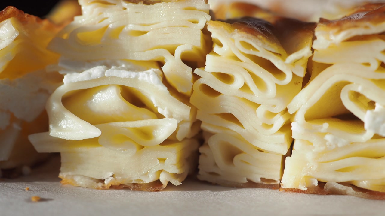 Close-up of Sliced Layered Cheese Pastry