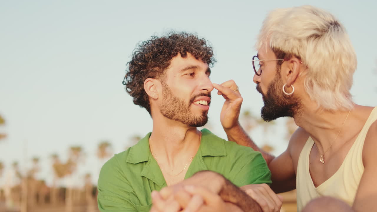 Affectionate Gay Couple Sharing an Intimate Moment Outdoors