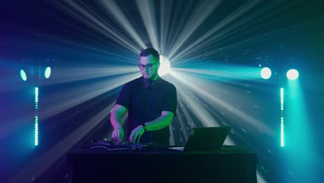 dj performing at a nightclub