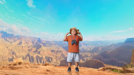 asian boy with a hat and binoculars using the magnifying glass then flexing his bicep while traveling at the top of mountain. boy researcher examines something, travel tourism adventure, full body