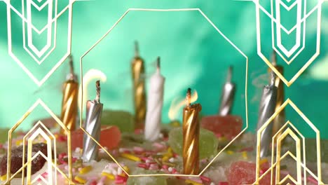 Golden-decorative-frame-design-over-burning-candles-on-a-cake