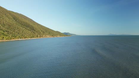 Drone-over-the-ocean-at-Ellis-Beach,-Cairns,-Queensland,-Australia