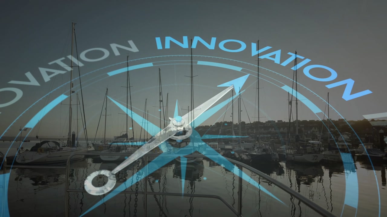 Fading in digital compass overlay over yacht bow, rotating arrow steering toward innovation sector