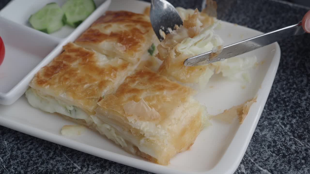 Delicious Turkish Pide with Cucumber Salad and Tomato