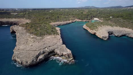 fly over beautiful scenic rocky coastline in mallorca, spain