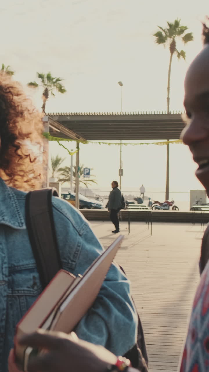Two Students Walking on Campus