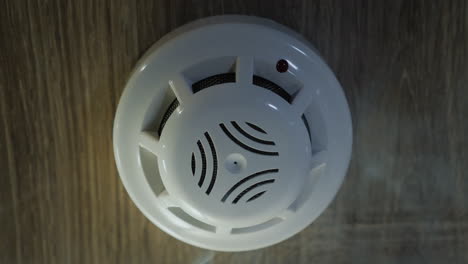 the smoke detector is triggered by a trickle of dum the red indicator lights up 4k video