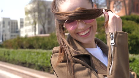 woman laughing outdoors