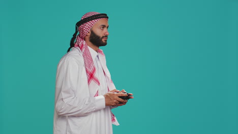 modern man playing games with controller