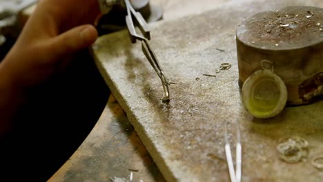 jewelry designer working in workshop 4k