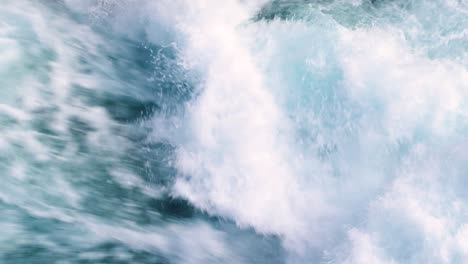 fast, rough turbulent whitewater rapids on the waikato river at huka falls in taupo, new zealand aotearoa