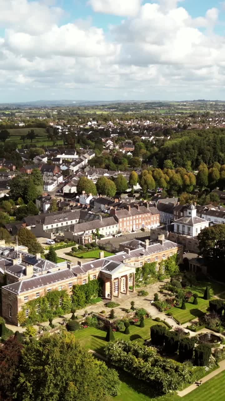 Wide social ratio 30FPS aerial of Hillsborough Castle and Estate in Northern Ireland. Produced in 1080x1920 with broadcast ready Rec709 color