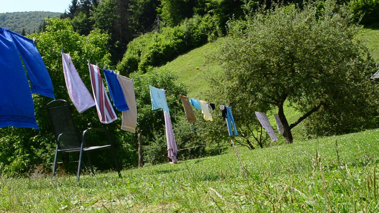 Linen in the yard. Linen against mountains