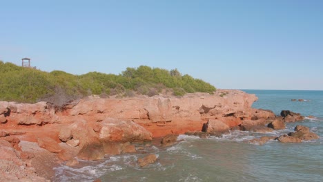 beautiful natural cove on the orange tree coast , spain