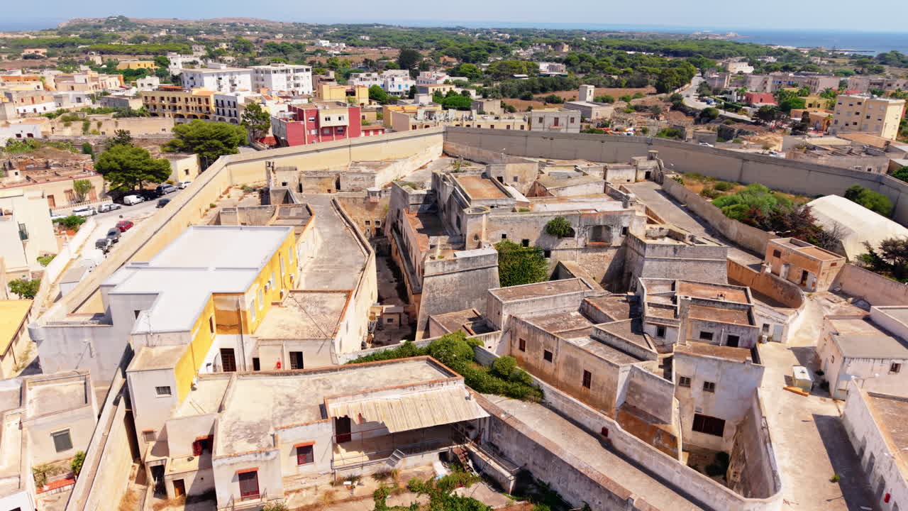 Aerial view of a town with a fort
