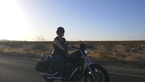 woman motorcyclist with dog