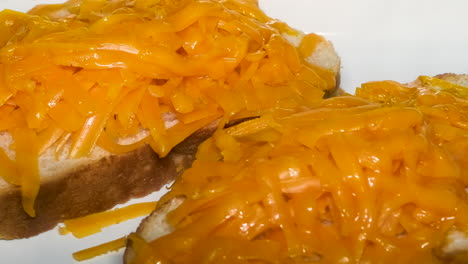 Cheese-melting-onto-crusty-hand-cut-bread-captured-with-time-lapse