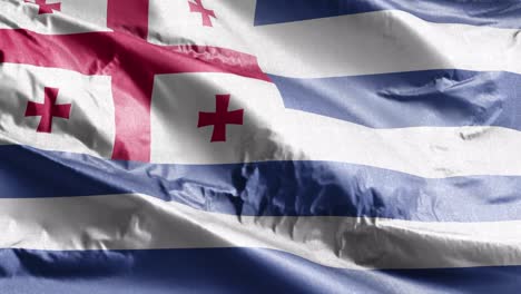 la bandera textil de ajaria ondeando en el bucle del viento. la bandera adjariana balanceándose en la brisa. el tejido textil de la tela. el fondo de relleno completo. bucle de 10 segundos.