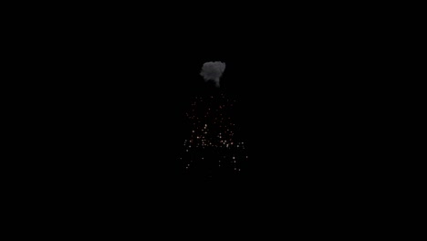 loop footage fireworks with sparkling lights and stars, ignites an explosion on a black background