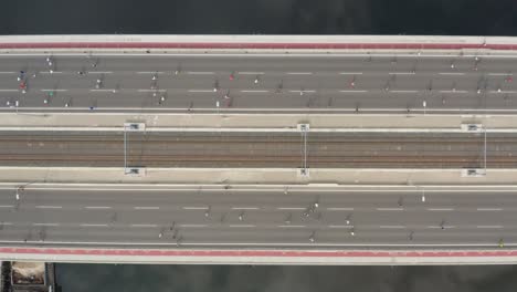 Top-View-Of-Runners-Running-At-The-Bridge-During-Belgrade-Marathon-In-Serbia