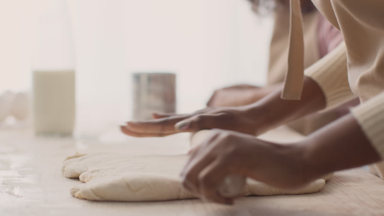 Woman Kneading Dough