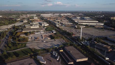 static aerial view at an industrial area at golden hour