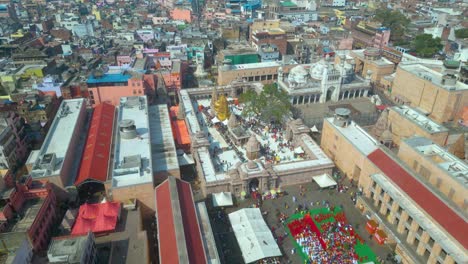 AERIAL-view-of-Dashashwamedh-Ghat,-Kashi-Vishwanath-Temple-and-Manikarnika-Ghat-Manikarnika-Mahashamshan-Ghat-Varanasi-India