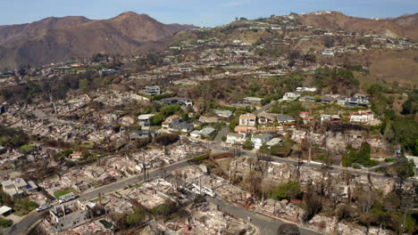 aerial view of wildfire devastation in a residential area