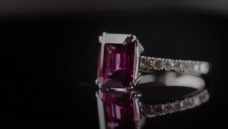 macro shot of a red ruby engagement ring